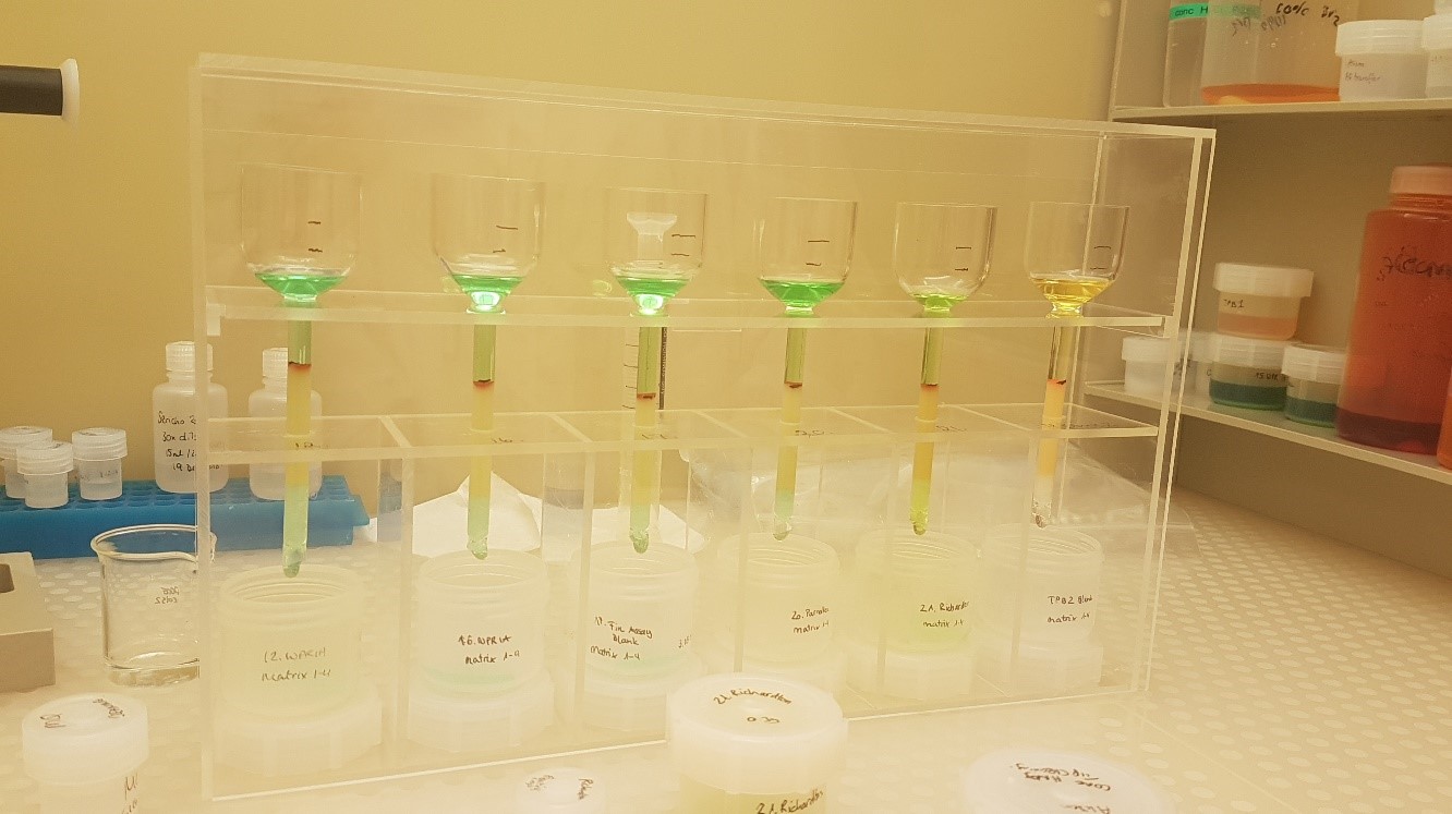 Figure: Photo of chondritic meteorites undergoing Pt isotope ion exchange chemistry in the Isotope Geochemistry and Cosmochemistry clean laboratory.